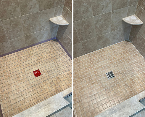 Shower Floor Before and After a Service from Our Tile and Grout Cleaners in Wayne