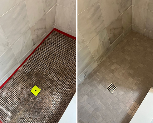 Shower Floor Before and After Our Hard Surface Restoration Services in King of Prussia